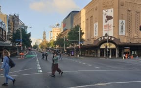 Few people were at Queen St's usually busy intersection after the country moved into alert level 3 to battle the Covid-19 pandemic.