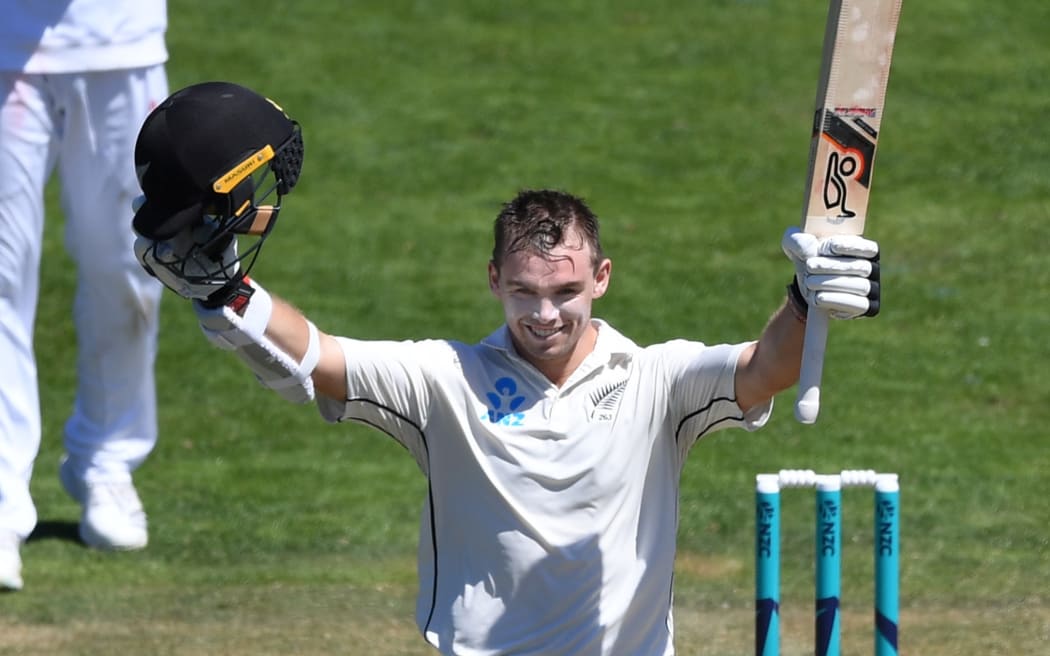 Tom Latham celebrates his double century at the Basin Reserve, Wellington.