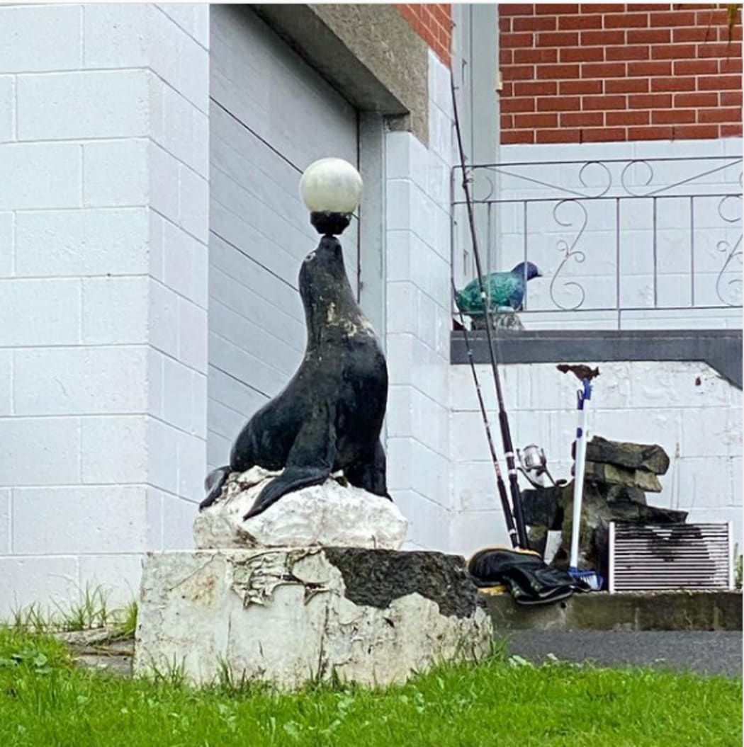 Suburban seal statue in an Auckland yard