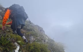 Ranger Ricki Mitchell moving carefully through the fog during the rescue on Wednesday morning.