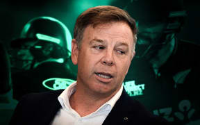 Composite of Scott Weenink and cricket players.