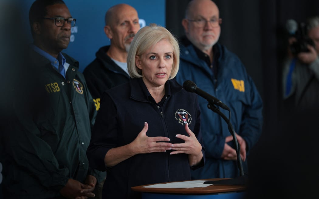 ARLINGTON, VIRGINIA- JANUARY 30: NTSB Chairman Jennifer Homendy speaks during a press conference at Reagan National Airport as the search continues at the crash site of the American Airlines plane on the Potomac River on January 30, 2025 in Arlington, Virginia. An American Airlines flight from Wichita, Kansas collided midair with a military Black Hawk helicopter while on approach to Ronald Reagan Washington National Airport outside of Washington, DC. According to reports, there were no survivors among the 67 people onboard both aircraft.  Kayla Bartkowski/Getty Images/AFP (Photo by Kayla Bartkowski / GETTY IMAGES NORTH AMERICA / Getty Images via AFP)