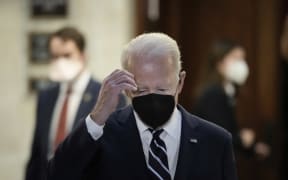 US President Joe Biden leaves a meeting with Senate Democrats in the Russell Senate Office Building on Capitol Hill on January 13, 2022 in Washington, DC.