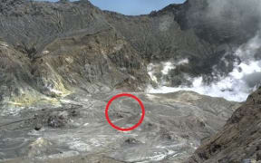 Figures can be seen inside the crater shortly before the eruption.
