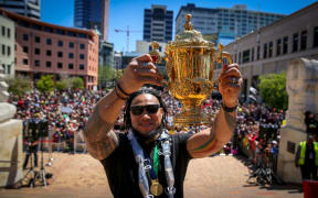 All Blacks Ma'a Nonu, lifting the Webb Ellis Cup in front of his home crowd.