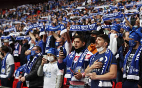 Leicester City fans cheer on their team ahead of the English FA Cup final football match between Chelsea and Leicester City at Wembley Stadium in north west London on May 15, 2021.