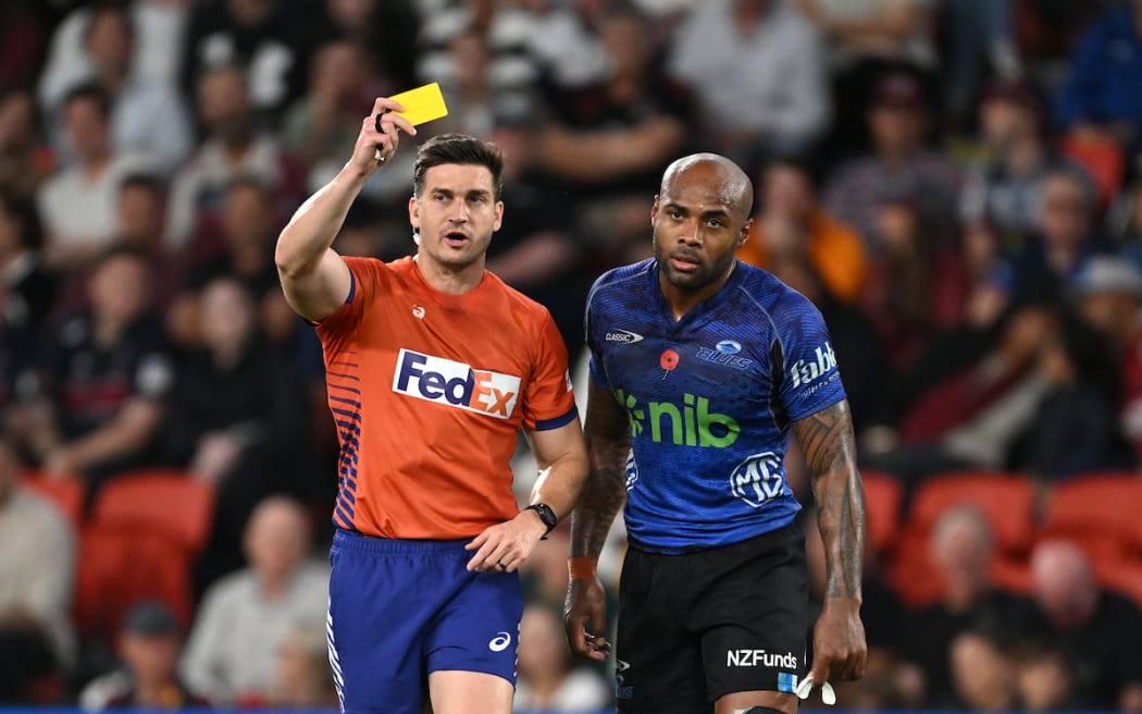 Mark Tele’a of the Blues is sent off for a dangerous tackle against the Reds.
