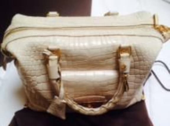 The $80,000 Louis Vuitton bag.