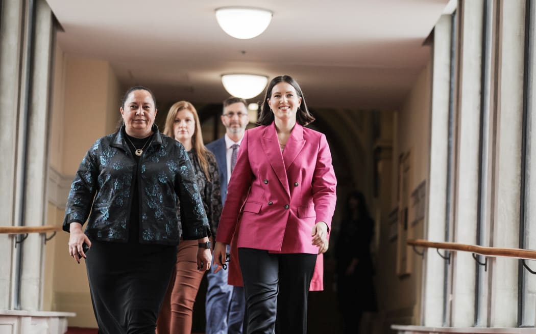 ACT party politicians arrive to the government signing ceremony.