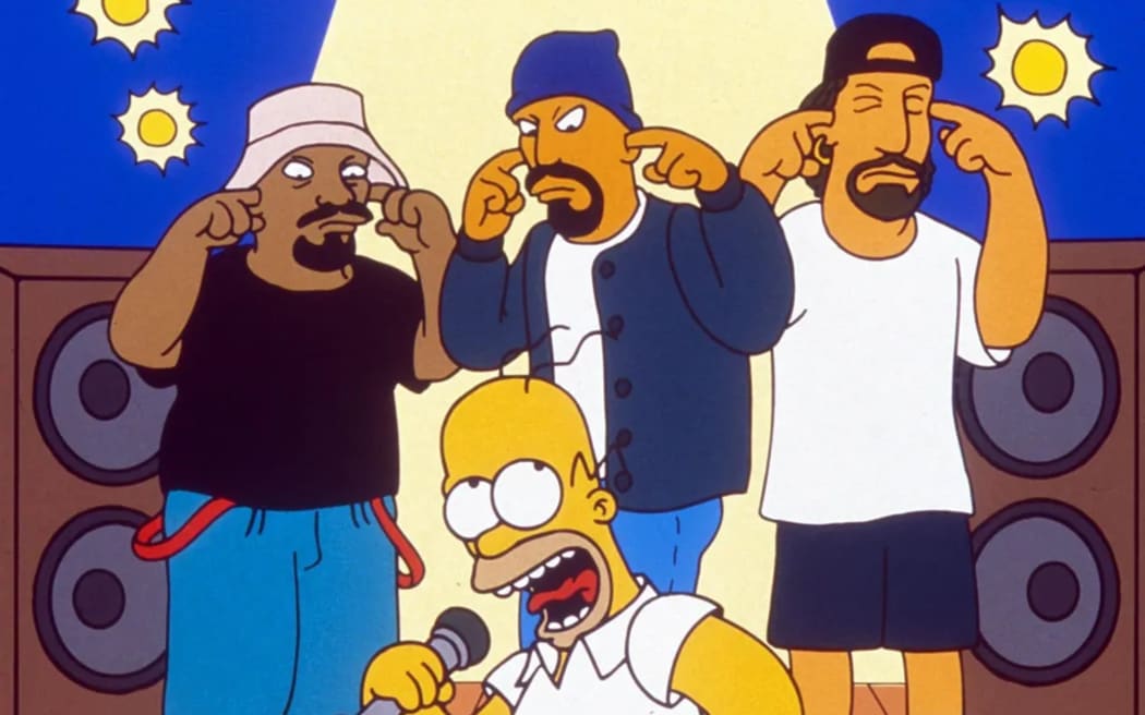 Homer Simpson and Cypress Hill in the prescient episode, called Homerpalooza.