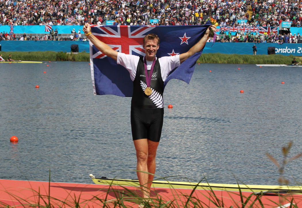 Mahe Drysdale celebrates winning gold in the Men's Single Sculls Olympic Rowing Final at the London 1012 Olympics.