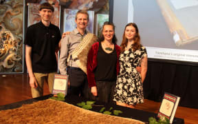 Ross Calman and his family, including his wife Ariana Tikao.