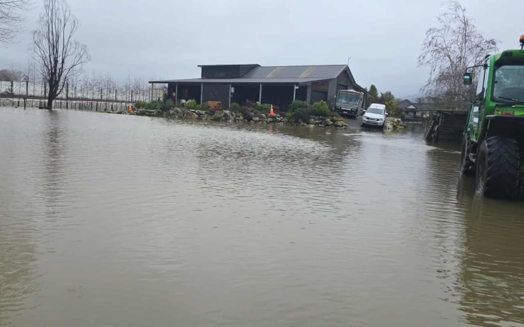 Pouesi and Hillary Fitisemanu's Riwaka home following the flooding of the Motueka River.