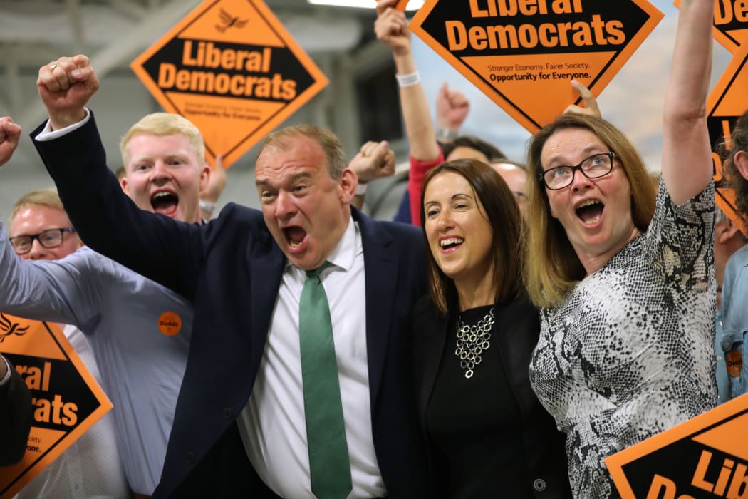 Liberal Democrat MP Ed Davey and Liberal Democrat candidate Jane Dodds celebrate after winning the Brecon and Radnorshire by-election at the Royal Welsh Showground on 2 August, 2019 in Wales.
