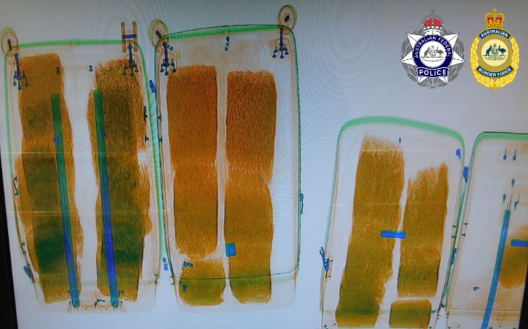 A New Zealander is accused of trying to import 38 kilograms of methamphetamine into Australia by hiding it under some towels in suitcases.