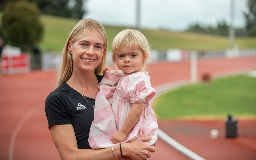 Camille French, pictured with her 22 month old daugher Sienna, is off to Paris in the marathon. She previously competed in the 5000m and 10,000m at the Tokyo Olympics.