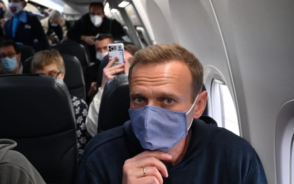 Russian opposition leader Alexei Navalny in a plane before takeoff from Germany bound for Moscow.