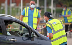 NHS workers at a Covid-19 testing centre in Bolton, England.