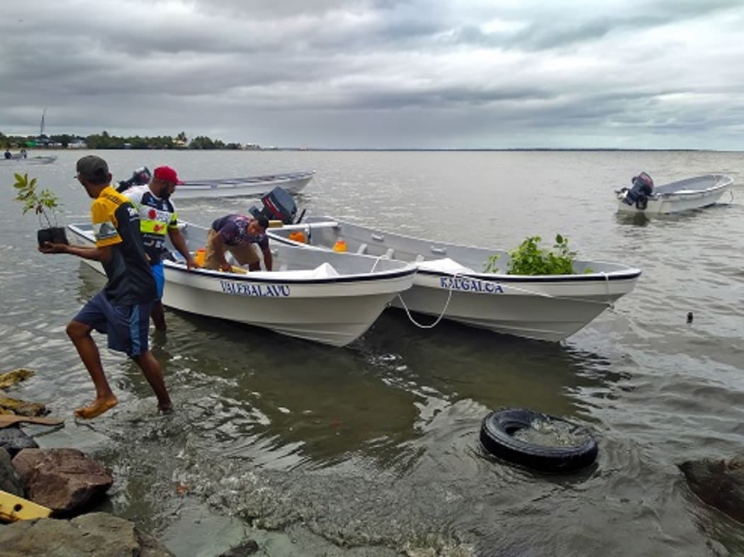 The new boats are prepped before leaving for Buliya village in Kadavu.