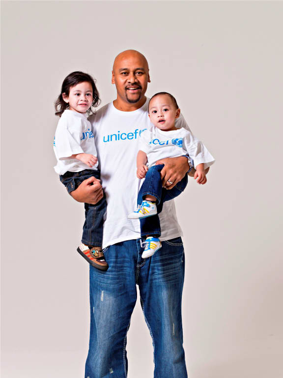 Jonah Lomu - pictured with his sons Brayley and Dhyreille - supported several charities, including UNICEF.
