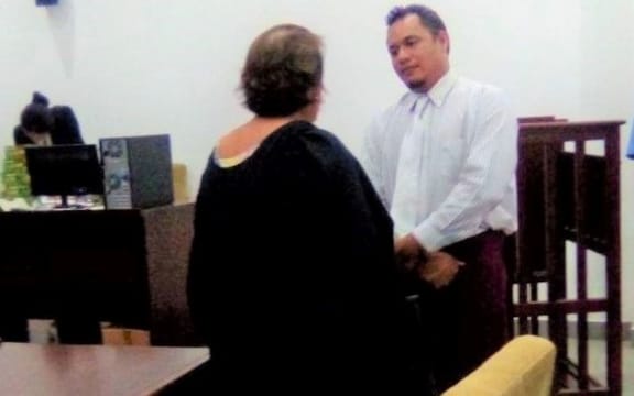 Daivd Nomeneta talking to his lawyer after the ruling