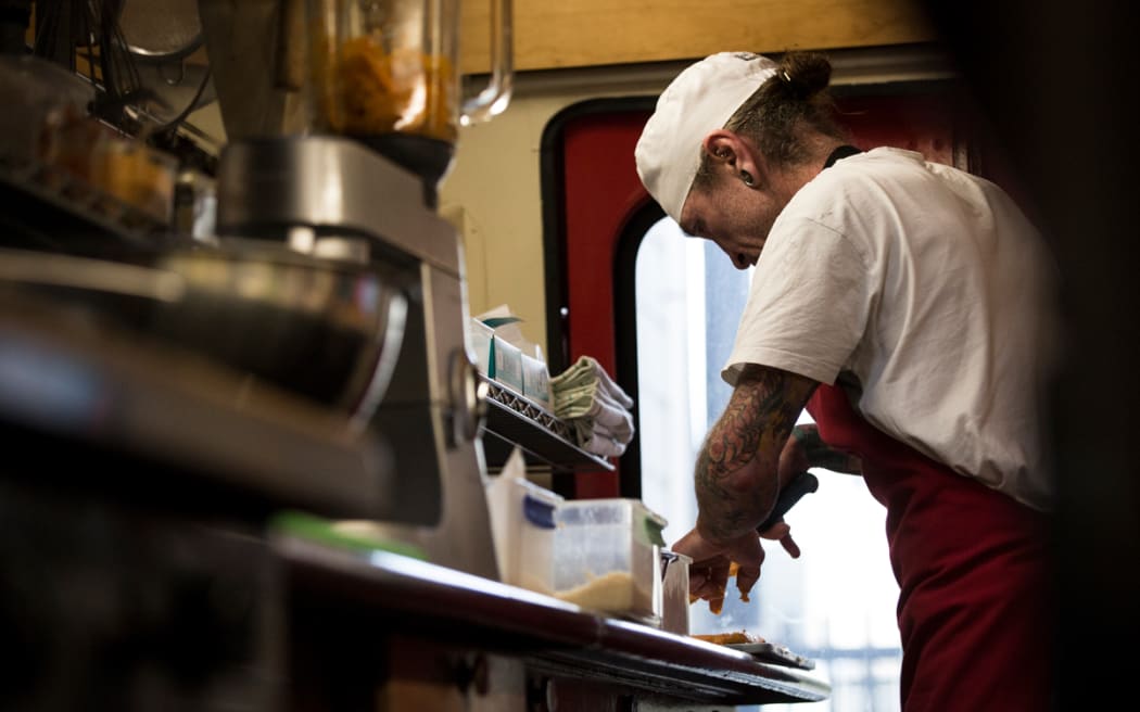 Shane Lunn at work in the Beat Kitchen food truck.