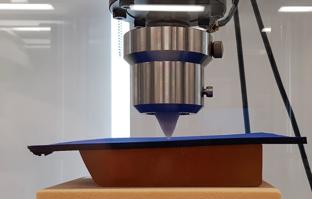 A machine used for early testing of the shark bite resistant fabric,at Flinders University, Adelaide.