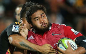 The Crusaders' Ben Funnell is tackled by by Chiefs' captain Liam Messam in their Super Rugby Match.