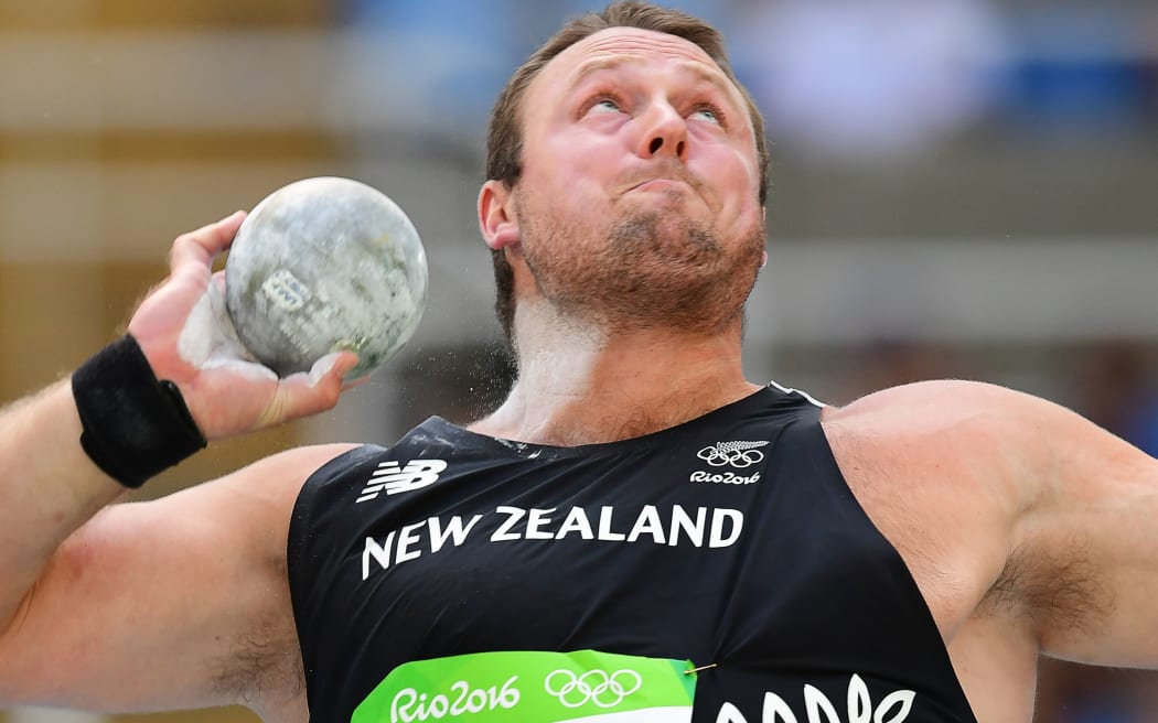 New Zealand's Tomas Walsh competes in the Men's Shot Put Qualifying Round during the athletics event at the Rio 2016 Olympic Games at the Olympic Stadium in Rio de Janeiro on August 18, 2016.