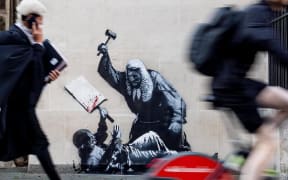 The artist posted an image of the work, which features a judge wielding a gavel over a protester on the ground holding a blood-splattered placard, on his Instagram page.