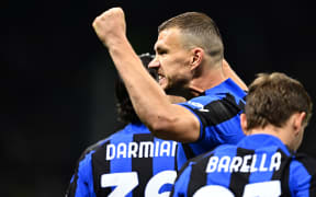 Inter Milan's Bosnian forward Edin Dzeko celebrates
