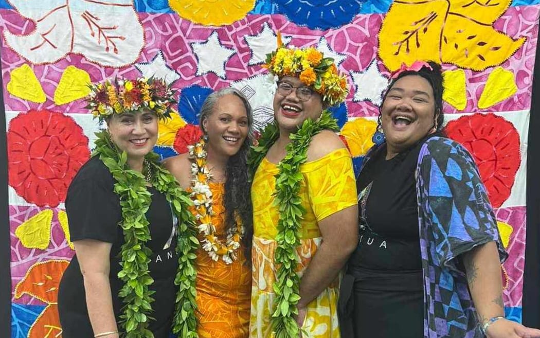 Pride Cook Islands team members celebrate the opening of the wearable arts exhibition night during Anuanua Week.