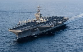 (FILES) This January 19, 2012 image provided by the US Navy, shows the Nimitz-class aircraft carrier USS Abraham Lincoln transiting the Arabian Sea. - The US will bolster its military presence in the Middle East, deploying additional warships and fighter jets to protect US personnel and defend Israel amid soaring tensions in the region, the Pentagon said on August 2, 2024. The aircraft carrier strike group led by the USS Abraham Lincoln will replace one helmed by the USS Theodore Roosevelt in the region, deputy Pentagon Press Secretary Sabrina Singh said. (Photo by Will Tyndall / US NAVY / AFP) / RESTRICTED TO EDITORIAL USE - MANDATORY CREDIT "AFP PHOTO / US NAVY/MASS COMMUNICATION SPECIALIST 3RD CLASS/WILL TYNDALL " - NO MARKETING NO ADVERTISING CAMPAIGNS - DISTRIBUTED AS A SERVICE TO CLIENTS