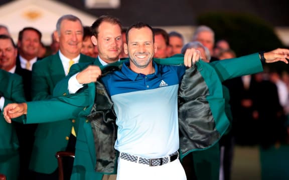 Sergio Garcia is presented with his Green Jacket.