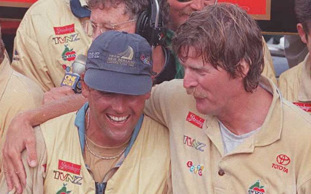 Team New Zealand syndicate head Peter Blake, right, embraces helmsman Russell Coutts after Black Magic 1 won the America's Cup in San Diego.