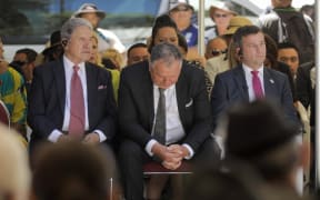 Shane Jones - flanked by Winston Peters and David Seymour - listens during whaikōrero at Waitangi 5 February 2024