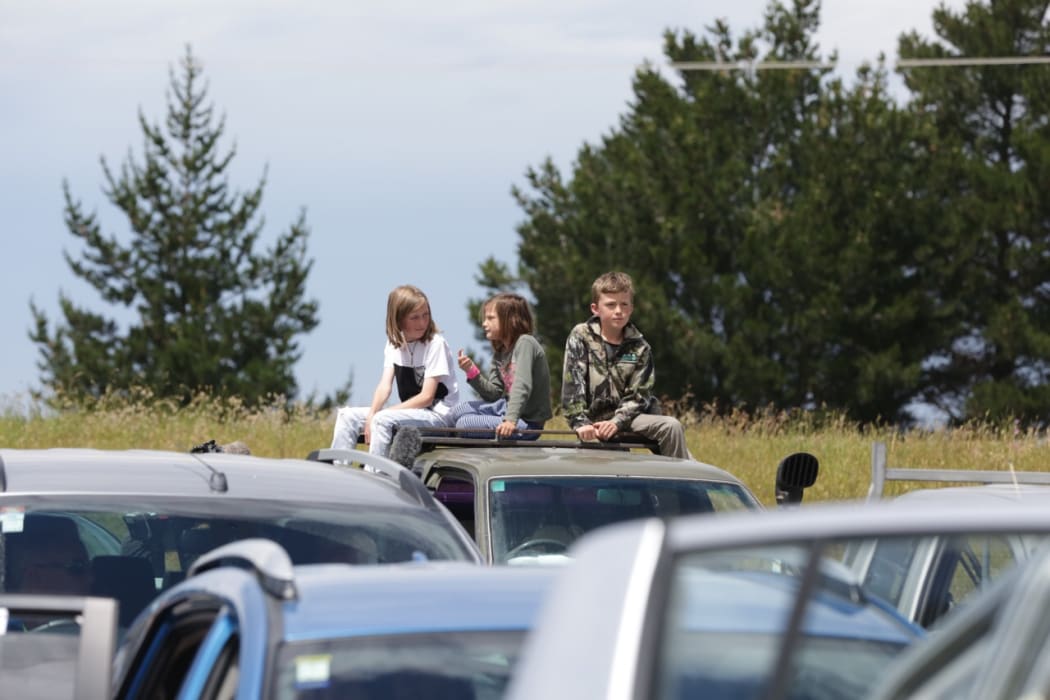 Peopel wait in their vehicles in Kaikoura in the hopes Civil Defence will lead them out of the quake-hit town today.