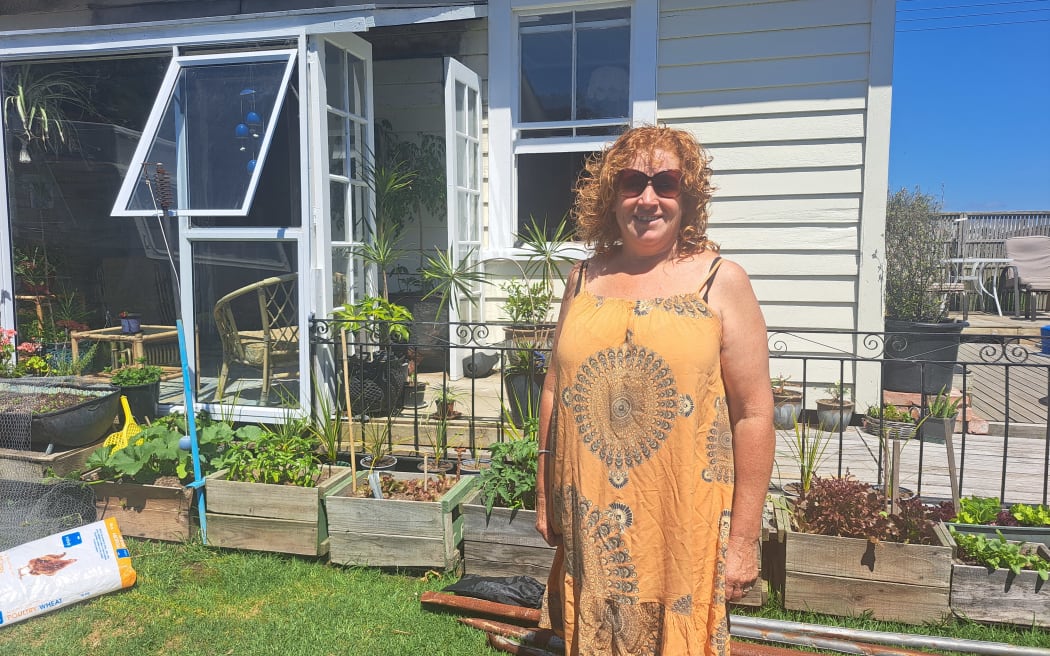 Jane Henry outside her Maketū home.