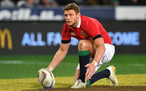 British and Irish Lions' Dan Biggar sets up a penalty kick.