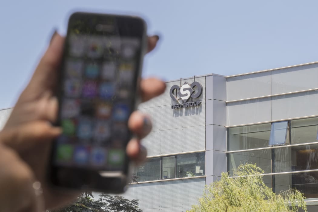 Phone in front of the building housing the Israeli NSO group, on August 28, 2016, in Herzliya, near Tel Aviv.