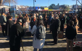 People gathered outside the court this morning.