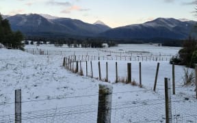 Snow-covered paddock viewed from Lewis Pass Motels.