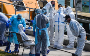 Emergency medical workers evacuate sick crew members with flu-like symptoms from cruise ships in Miami Requests were made by Costa Magica and Costa Favolosa for life-critical care ashore for multiple crew members presenting with respiratory symptoms consistent with pneumonia and bronchitis.