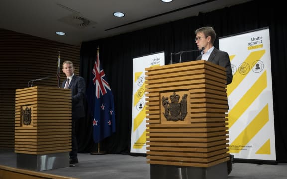 POOL - Covid-19 Response Minister Chris Hipkins, left, and Director General of Health Dr Ashley Bloomfield during their Covid-19 and vaccines update at Parliament, Wellington, on day 5 of the alert level 4 lockdown  22 August, 2021  NZ Herald photograph by Mark Mitchell