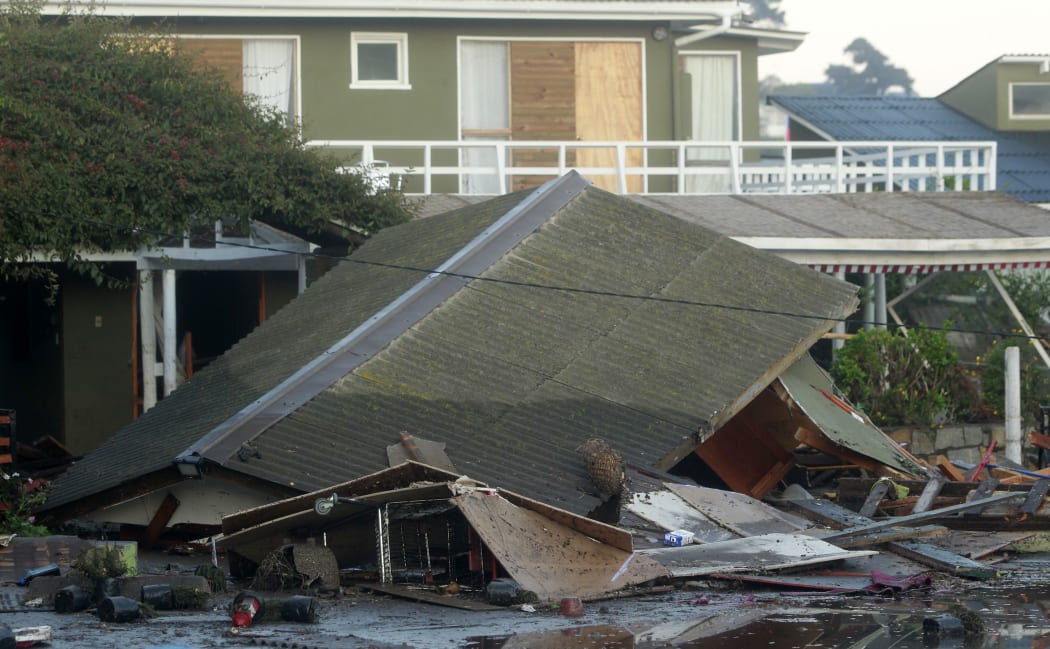A collapsed structure in Concon, 110 km northwest of the capital Santiago, hit by an 8.3-magnitude earthquake.