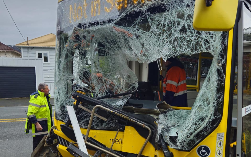 Smashed windscreen on a Metlink bus that crashed into a house's brick fence on a major Wellington road.