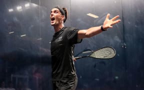 Paul Coll of New Zealand celebrates after winning the Gold medal match against Joel Makin of Wales in the Men's Singles Squash Final at the Birmingham Commonwealth Games.