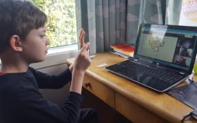 Oskar Graham-Smith connects up with his class from Rawhiti School in Christchurch this morning for learning at home during the Covid-19 lockdown.