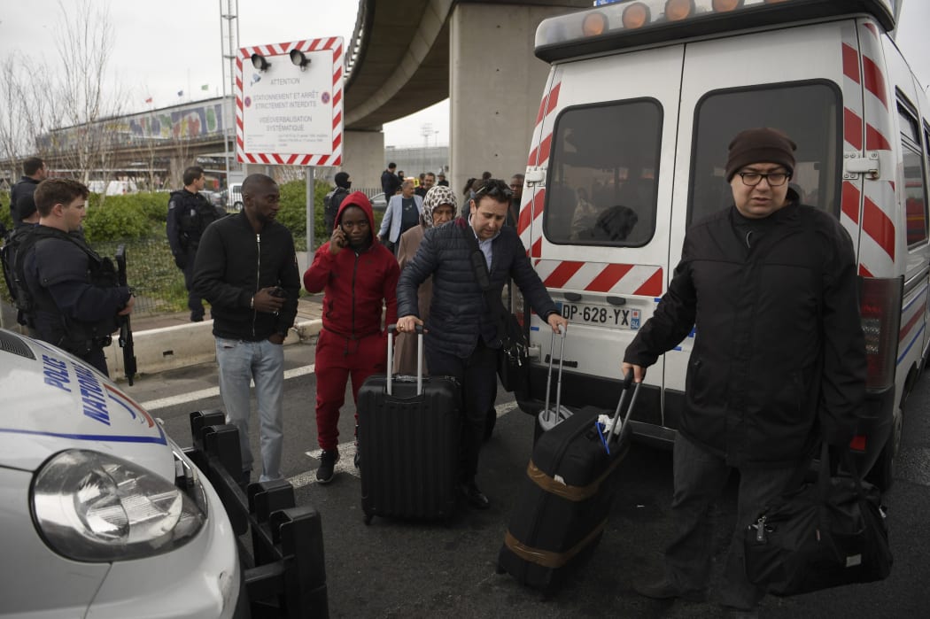 Travellers were evacuated from Orly airport after the shooting.