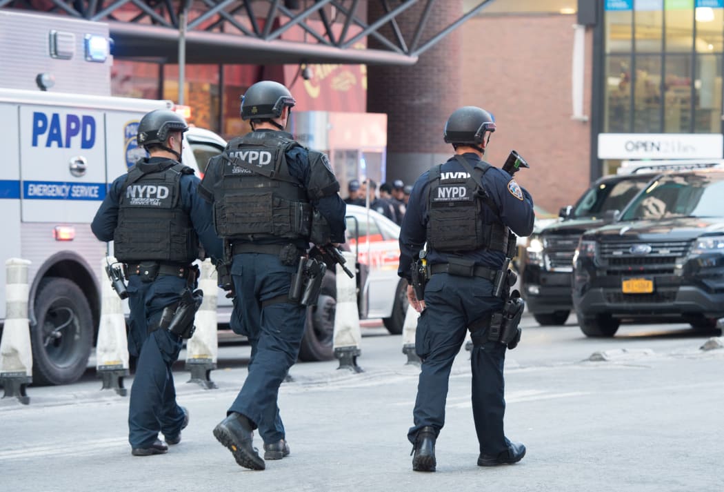 Police respond to the explosion at the Port Authority Bus Terminal in Manhattan.